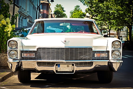 classic white car near building thumbnail