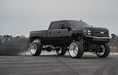 black Chevrolet crew cab pickup truck thumbnail