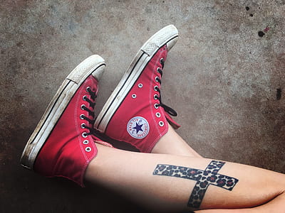 photo of person wearing red Converse Chuck Taylor high-rise thumbnail