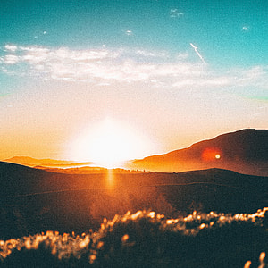 photo of mountains during golden hour thumbnail