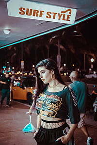 woman staring down under of Surf Style signboard thumbnail