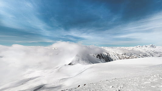 white mountain at daytime thumbnail