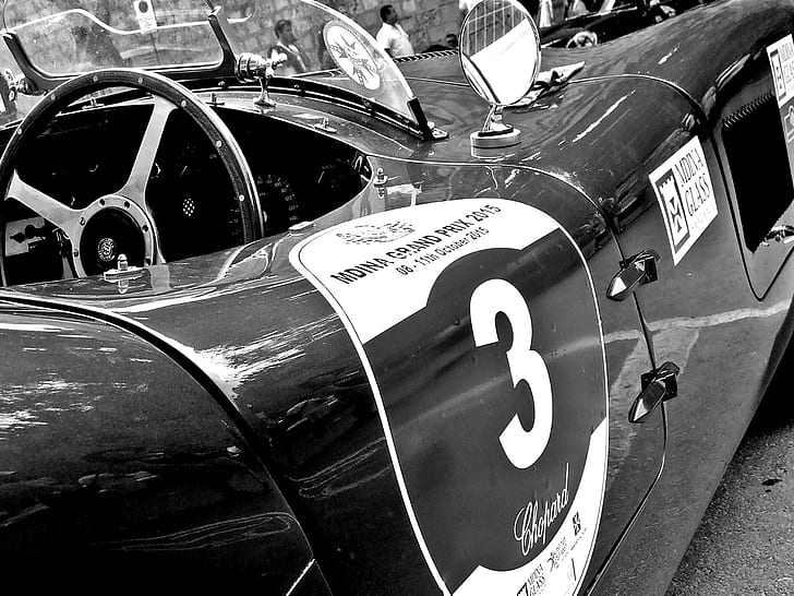 grayscale photography of vehicle