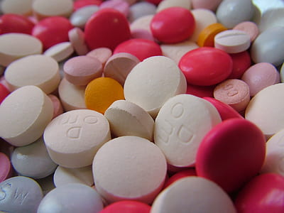 close-up photo of assorted-color medication pills thumbnail