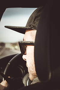 man driving car thumbnail