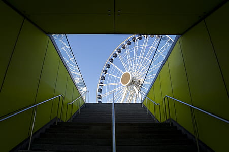 staircase leading to white and black ferris wheel thumbnail