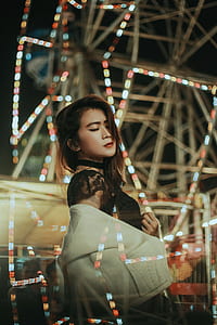 woman wearing black lace top and white cardigan thumbnail
