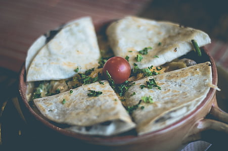 baked rotis on brown bowl thumbnail