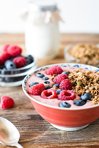orange ceramic bowl with strawberries and grapes thumbnail