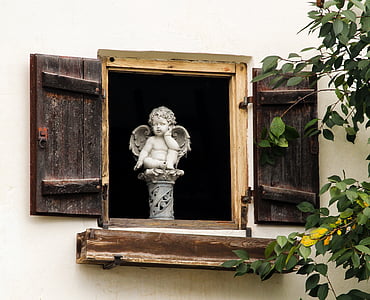 gray angel statue thumbnail