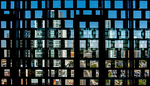 picture of glass high rise building at the city thumbnail