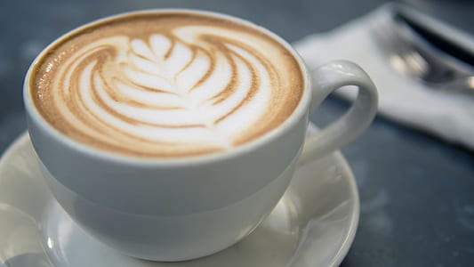 white teacup on saucer thumbnail