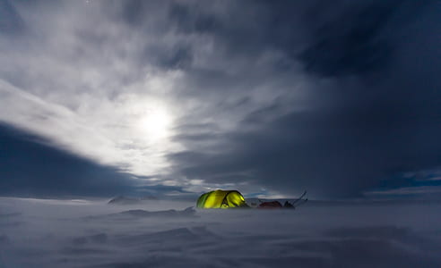 photo of green tent on snowfield thumbnail