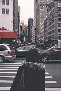 woman crossing pedestrian lane thumbnail