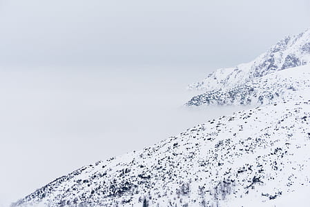 snow capped mountain during daytime thumbnail