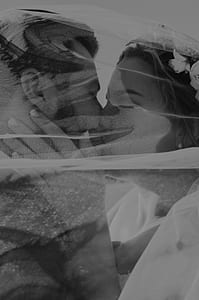 couple kissing inside veil thumbnail