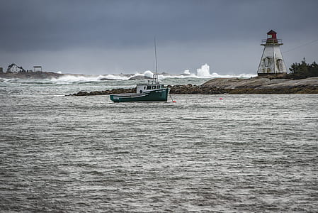 sailboat near lighthouse thumbnail