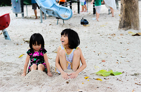 Kids on the sandy playground thumbnail