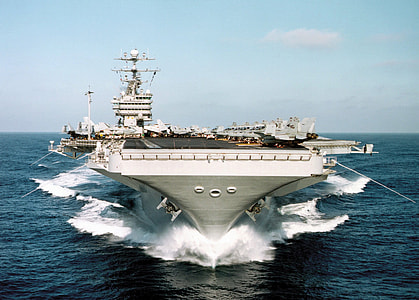 white and black aircraft carrier during daytime thumbnail