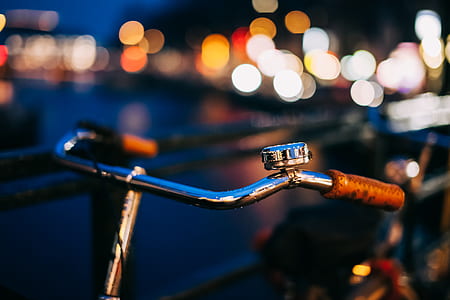selective-focus photography of silver bicycle handle thumbnail
