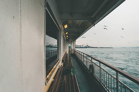 White Building Beside Body of Water thumbnail