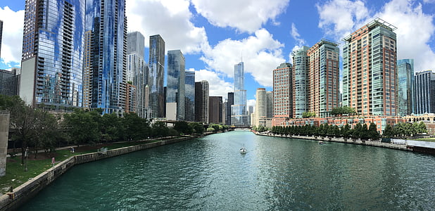 broad river scenery surrounded with high-rise buildings thumbnail