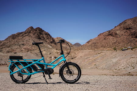 teal bicycle on road thumbnail