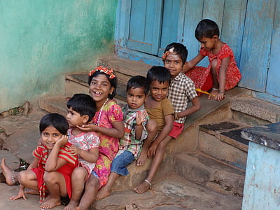 seven children on concrete staircase thumbnail