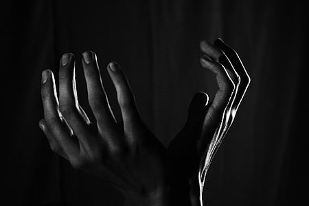 grayscale photography of human hands thumbnail