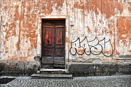 brown wooden French door behind walls thumbnail