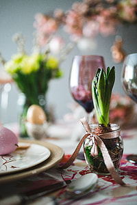 Easter table with cute pink decorations, flowers, catkins and eggs thumbnail