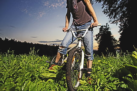 man riding on white BMX bicycle thumbnail