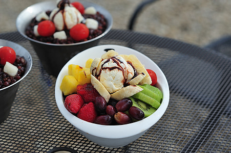 berries with ice cream on bowl thumbnail
