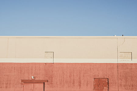 beige and brown painted concrete building thumbnail