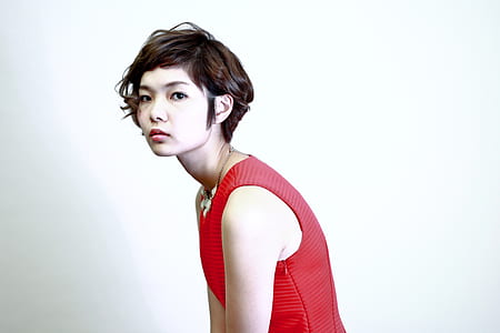 Woman Wearing Red Sleeveless Top thumbnail