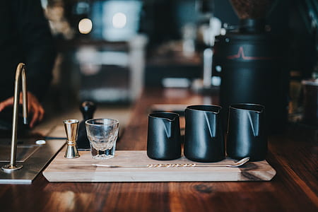 three black ceramic pitchers thumbnail