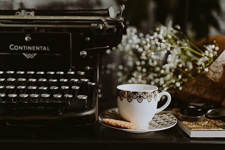 Coffee in a decorative cup with a golden ornament thumbnail