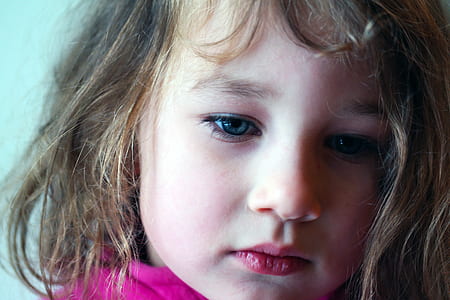 close-up of girl in pink top thumbnail