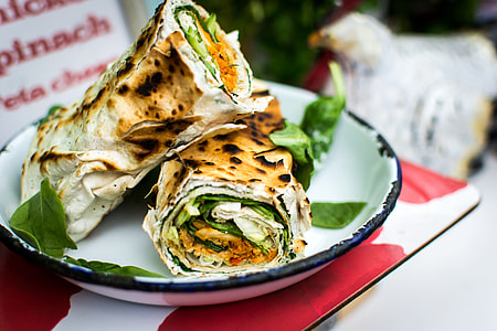 Healthy vegetarian wrap with spinach thumbnail