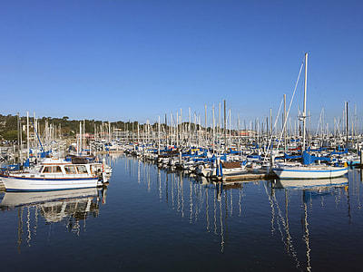 assorted-color docked motorboats thumbnail
