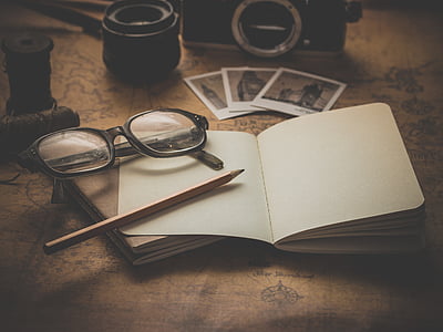 textbook with eyeglasses thumbnail