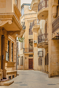 alleyway surrounded by houses thumbnail