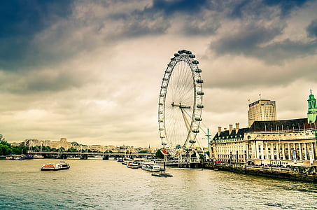 Ferris wheel near body of water thumbnail