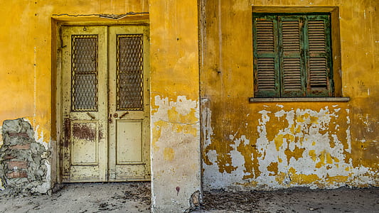 yellow concrete house with window thumbnail
