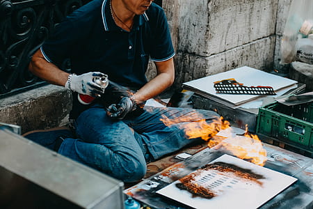 man holding spray bottle thumbnail