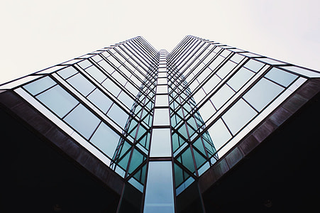 clear glass building reflection itself in clear glass window thumbnail