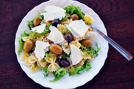 Pasta salad on dinner plate thumbnail