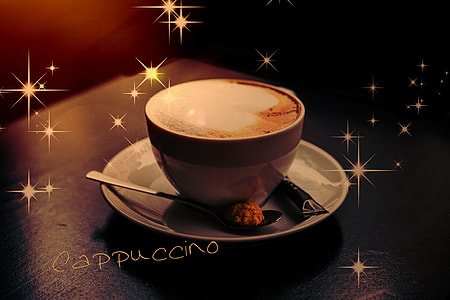 white cup of latte placed on black table thumbnail