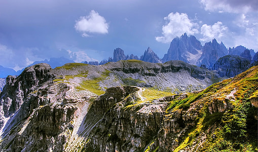 photo of a mountain range during mildly cloudy day thumbnail