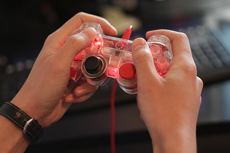 person playing game controller thumbnail